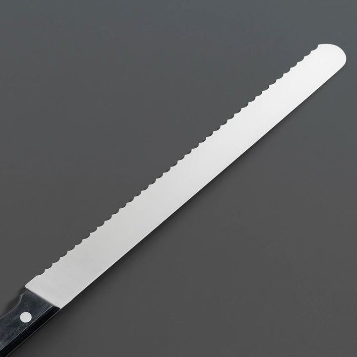 Misono molybdenum steel bread knife showcasing lasting sharpness, back view of the blade.