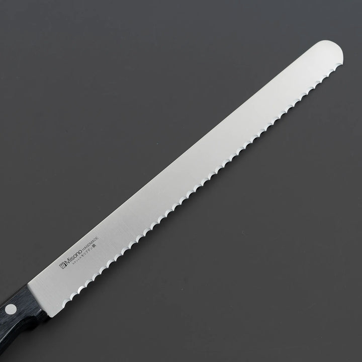 Misono molybdenum steel bread knife with lasting sharpness, front view of the blade